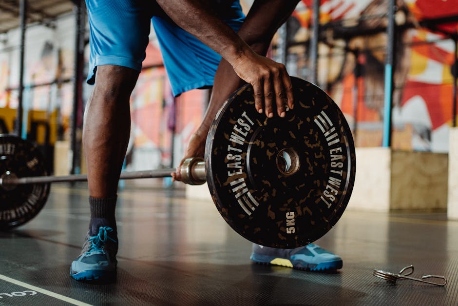 Athlete tracking weekly strength training schedule showing how many days a week should you lift for optimal muscle growth